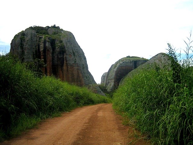 Angola road via https://pixabay.com/en/angola-sky-clouds-rocks-stones-78212/