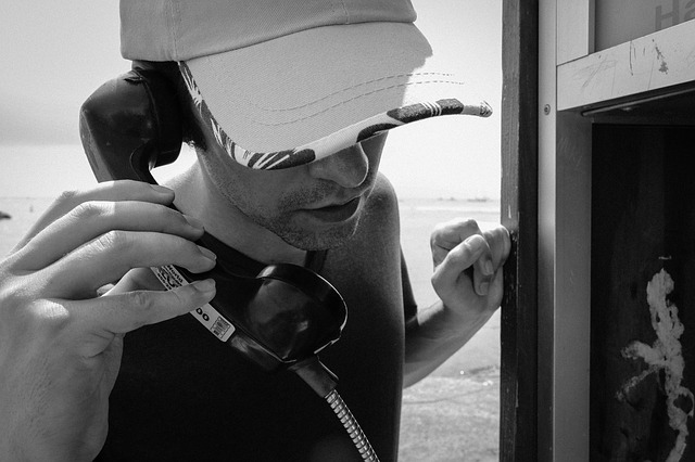 Man with phone via https://pixabay.com/en/man-male-person-phone-pay-phone-937288/